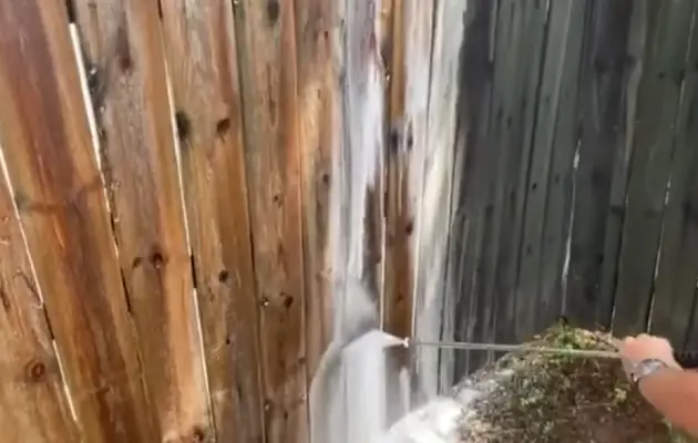 Pressure washing a fence